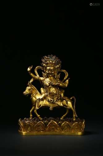 A gilt-bronze figure of Palden Lhamo