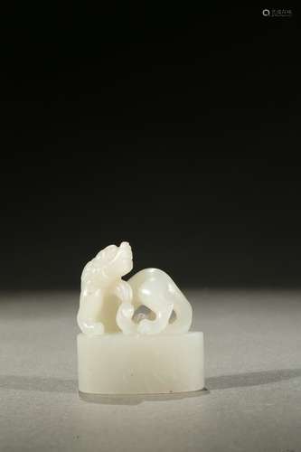 A white jade carved oval seal