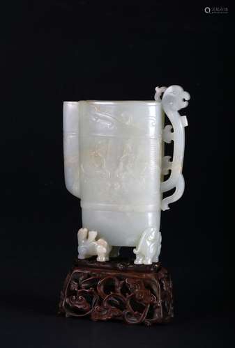 A green white jade 'chilong' vessel