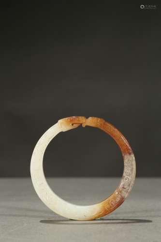 A white and russet bangle