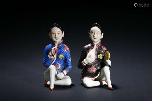 A pair of famille rose erotic lady figures
