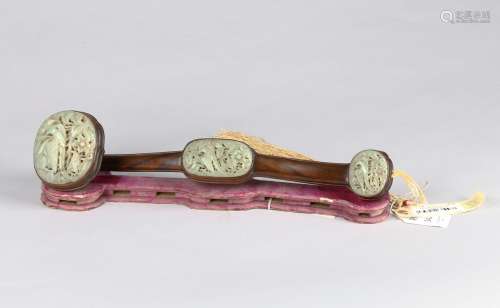 A rosewood openwork white jade inlaid ruyi scepter