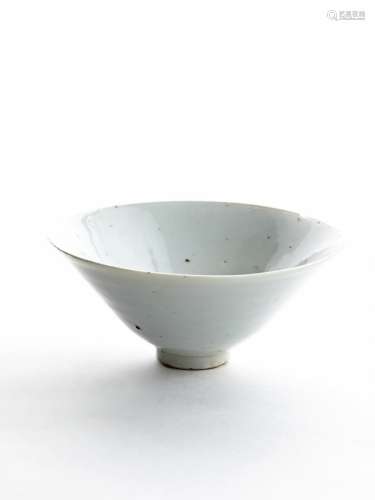 A white glazed conical bowl