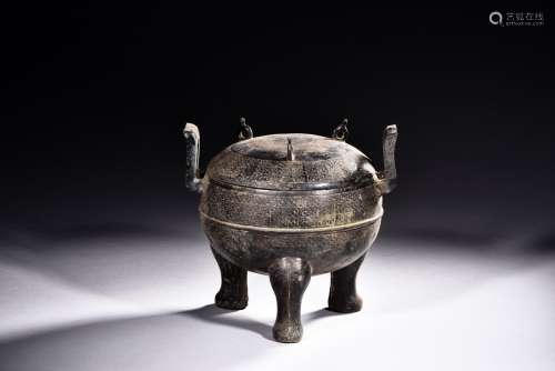 An archaistic bronze tripod ding vessel