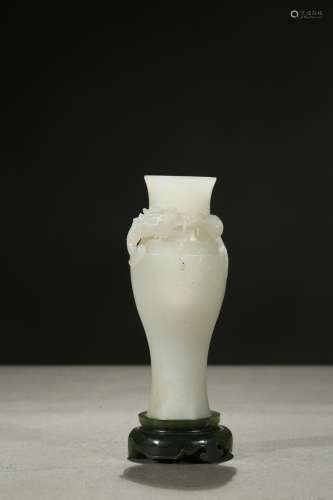 A white jade 'dragon' vase with stand