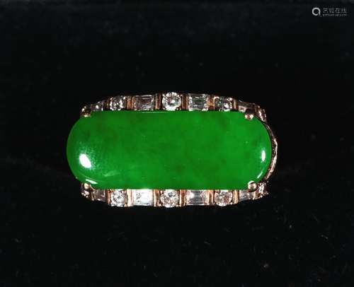 A jadeite and diamond gold ring