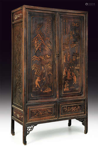 An inlaid hard wood wardrobe