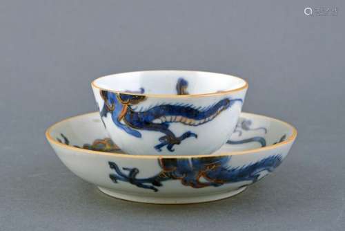 A FINE PORCELAIN CUP AND SAUCER
