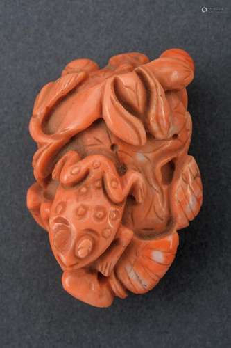 A CARVED SMALL PINK CORAL