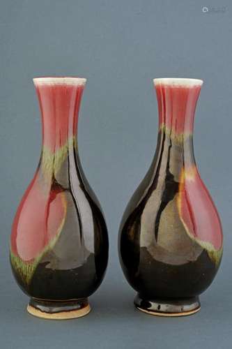 A PAIR OF FLAMBE' PORCELAIN VASES