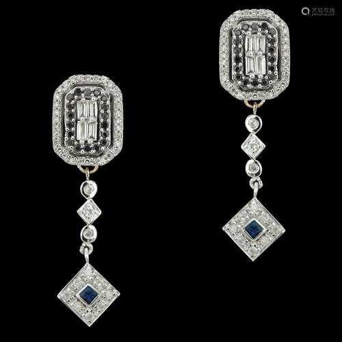 A PAIR OF 14K WHITE GOLD EARRINGS