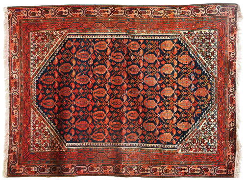 AN OLD PERSIAN RUG
