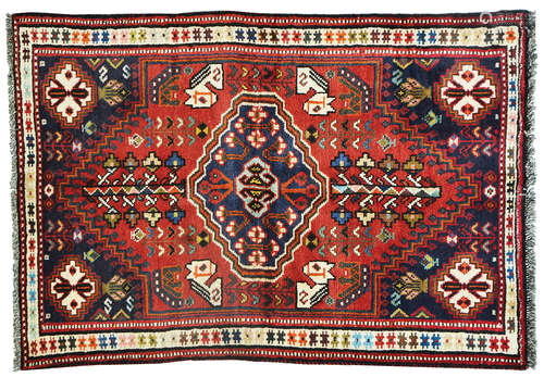 A PERSIAN SHIRAZ RUG