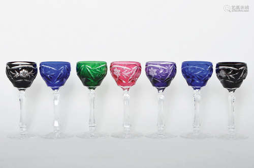 A SET OF SEVEN CUT TO CLEAR COLOR CRYSTAL LIQUER GOBLETS