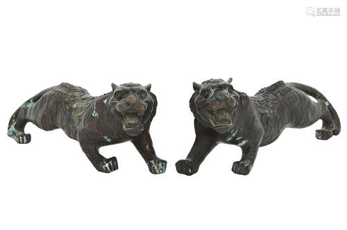 A PAIR OF CHINESE CAST BRONZE TIGERS