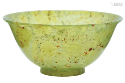 A CARVED CHINESE RUSSET JADE BOWL