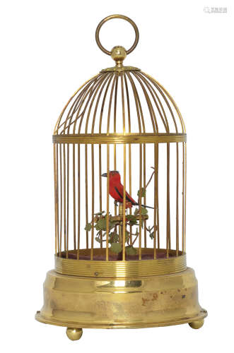 An old gilded metal bird cage