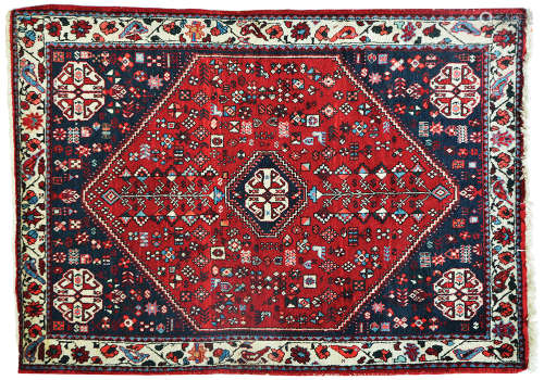 AN OLD PERSIAN SHIRAZ RUG