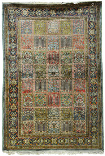 AN ANTIQUE PERSIAN BAKHTIAR RUG