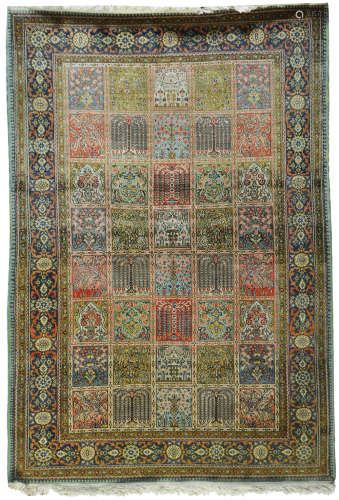 AN ANTIQUE PERSIAN BAKHTIAR RUG