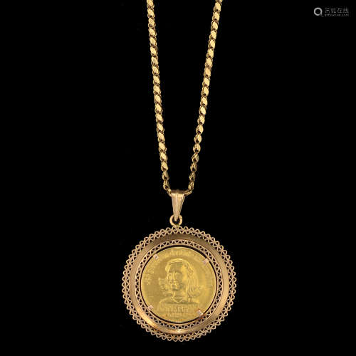 A 14K GOLD, ANNE FRANK COIN PENDANT
