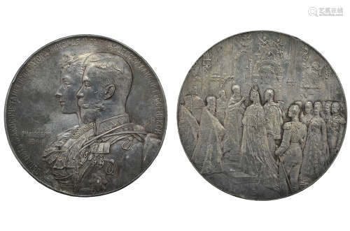 A SILVERED BRONZE COMMEMORATION MEDAL