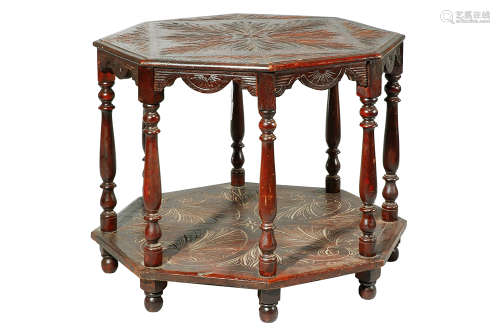 A FRENCH RENAISSANCE STYLE RUSTIC OCTAGONAL TABLE