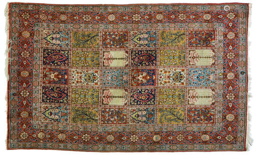 AN OLD PERSIAN QOM RUG