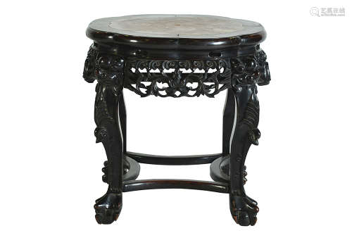 A CHINESE CARVED PADAUK WOOD TABLE