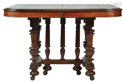 AN EXTENDING DINING TABLE