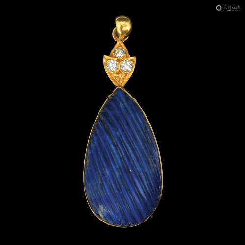 A 14K GOLD PENDANT