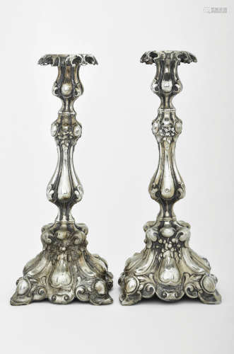 A PAIR OF SILVER BAROQUE STYLE CANDLESTICKS