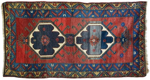 AN OLD CAUCASIAN KAZAK RUG