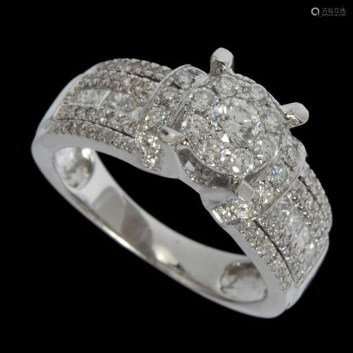 AN 18K WHITE GOLD RING