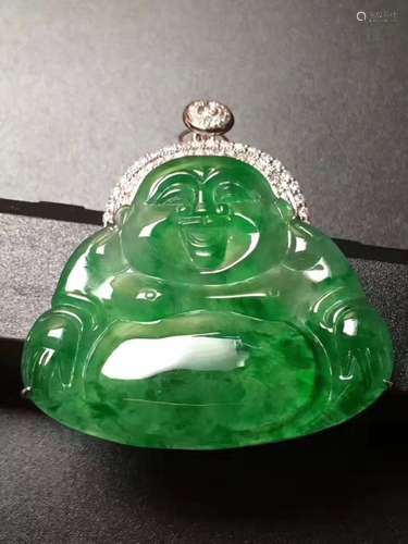 A CARVING BUDDHA JADEITE PENDANT