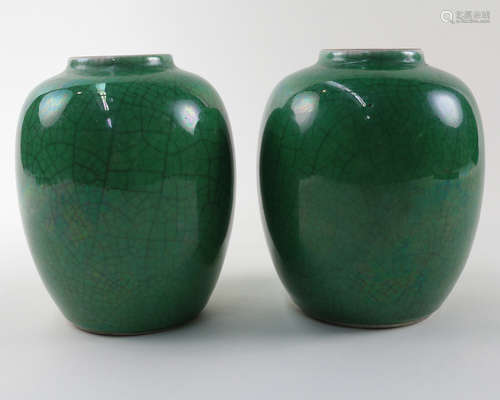 PAIR OF GREEN GLAZE GROUND OVOID VASES