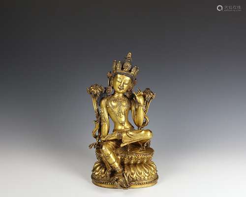 GILT-BRONZE FIGURE OF BUDDHA