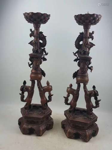 PAIR OF RED COPPER CANDLE HOLDERS