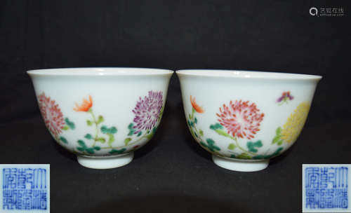 PAIR OF FAMILLE-ROSE CUPS WITH QIANLONG MARK