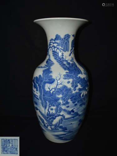 A BLUE AND WHITE BOTTLE VASE WITH QIANLONG MARK