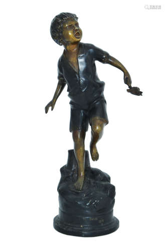 A PATINATED BRONZE FIGURE OF A BOY HOLDING A CRAB