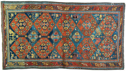 AN ANTIQUE CAUCSSIAN SHIRVAN RUG