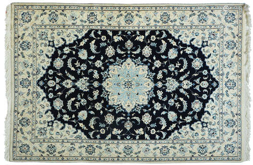 A PERSIAN NAIN RUG