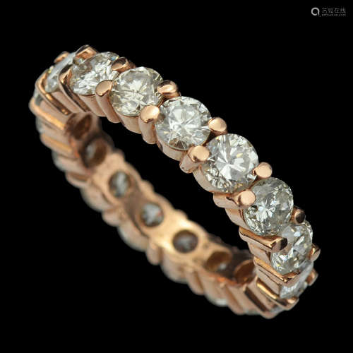 A 14K GOLD ETERNITY RING