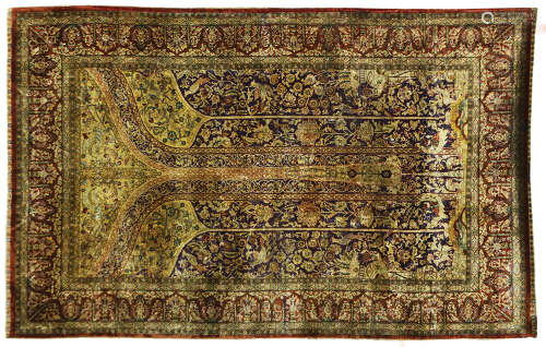 AN ANTIQUE TURKISH HEREKEH SILK RUG