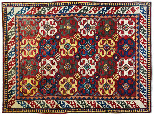 AN AFGHAN CAUCASIAN PATTERN RUG