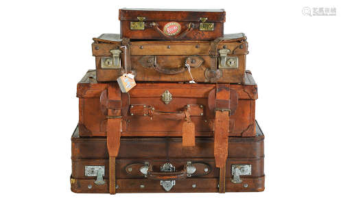 FOUR VINTAGE LEATHER LUGGAGE CASES