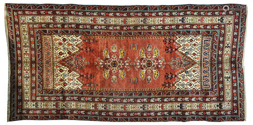 AN OLD CAUCASIAN RUG