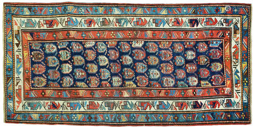 AN OLD CAUCASIAN MARASALI RUG