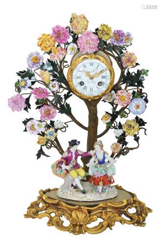 A FRENCH PORCELAIN AND BRONZE CLOCK